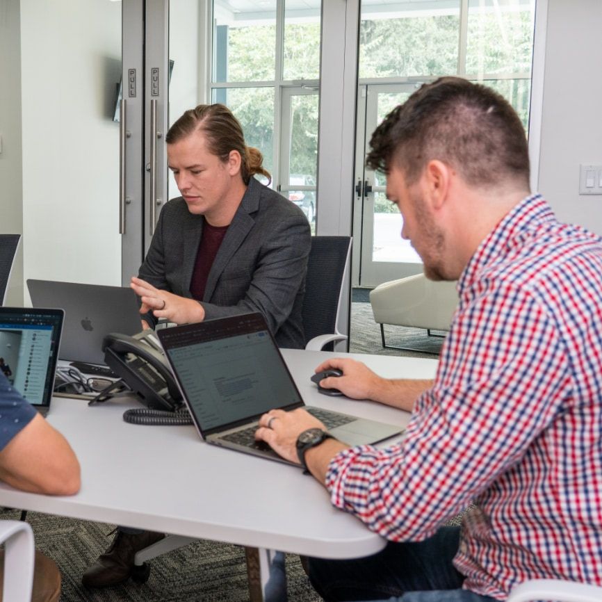 Kelp team collaborating in the office